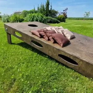 populiarus komandinis lauko žaidimas, puikiai tinkantis teambuildingams, gimtadieniams, įmonių šventėms ir aktyviam laisvalaikiui. Meskite kukurūzų maišelius į taikinį, rinkite taškus ir siekite pergalės iki 21 taško! Galimi individualūs užsakymai. Užsisakykite kokybiškus lauko žaidimus tiesiai iš gamintojo medzio karma