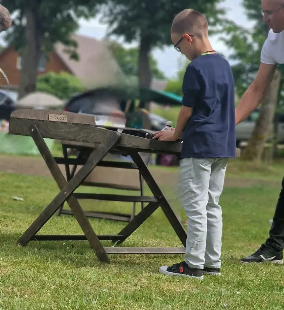 Musyčių dvikova lauko žaidimas naudojimui renginiuose, mokykloms ir bendruomenėms Medistau - medžio karma