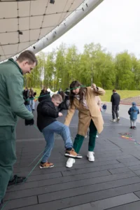 Outdoor Games Festival in Šiauliai, Lithuania: people playing large wooden games, photo 1