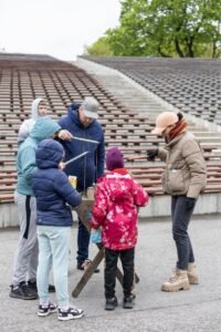 Outdoor Games Festival in Šiauliai, Lithuania: people playing large wooden games, photo 17