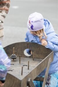 Outdoor Games Festival in Šiauliai, Lithuania: people playing large wooden games, photo 22